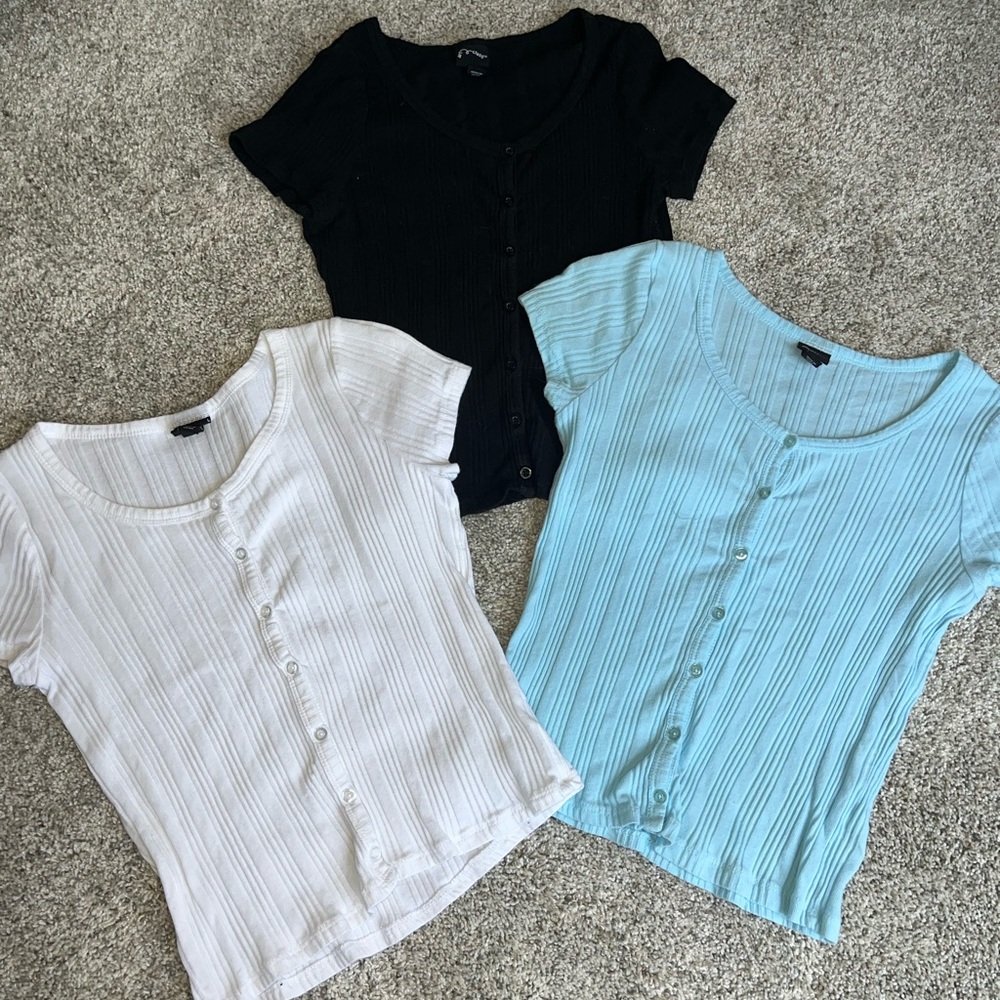 Three Target art class tops size L (10/12). Light blue, black,and white.